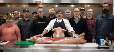 Brian Polcyn poses with class at the opening of Noble Craft of Charcuterie